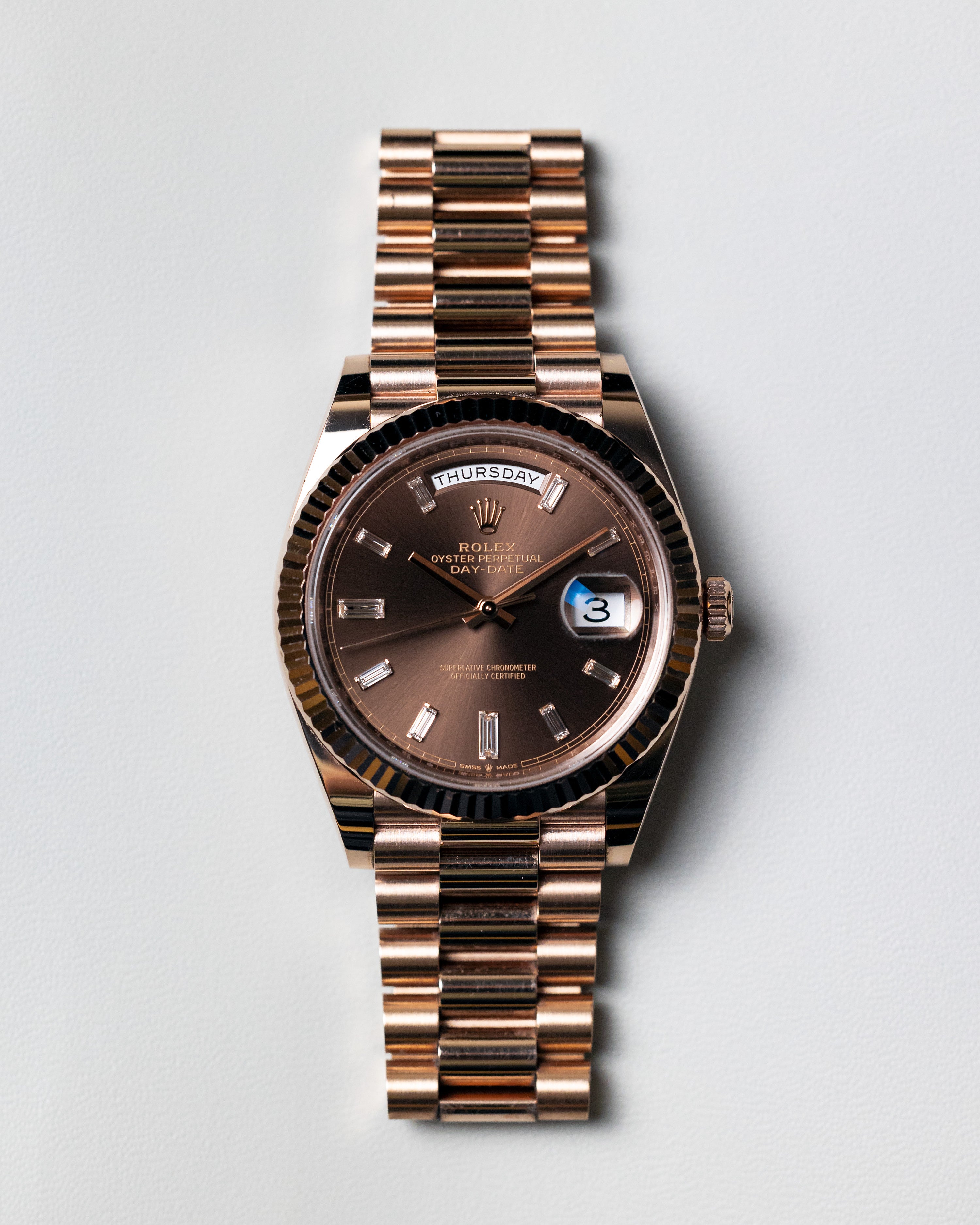 Rolex Day-Date 40mm Rose Gold Chocolate Baguette dial 228235