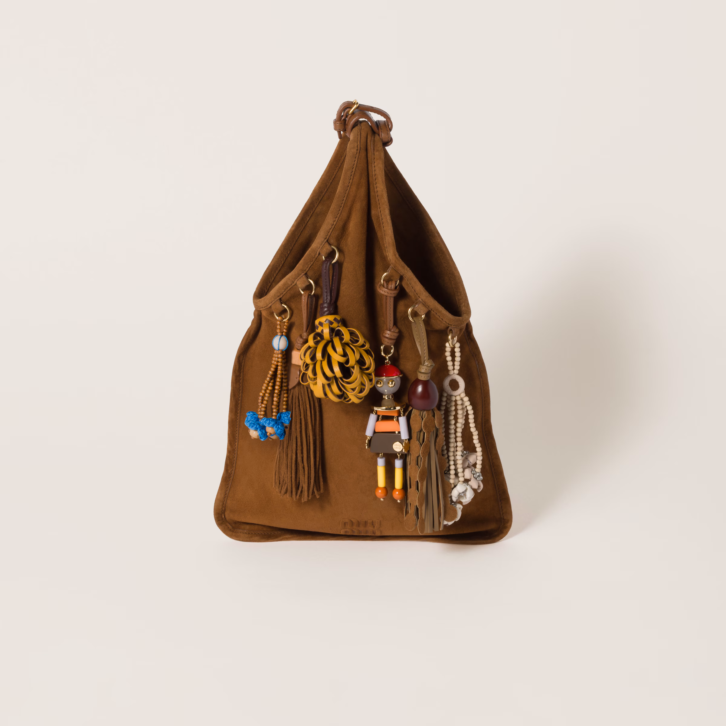 Sac MiuMiu en daim avec motif en chêne - luxuryevafr